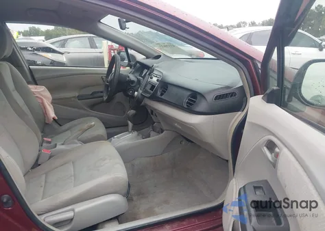 2011 Honda Insight z USA, uszkodzony, nr VIN JHMZE2H38BS011739